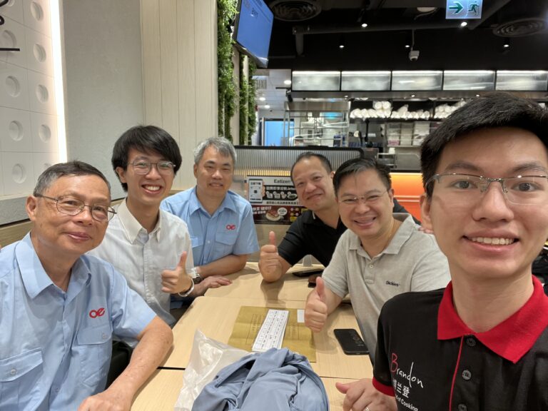 A group of OE, Brandon, Maxim staff having selfie together